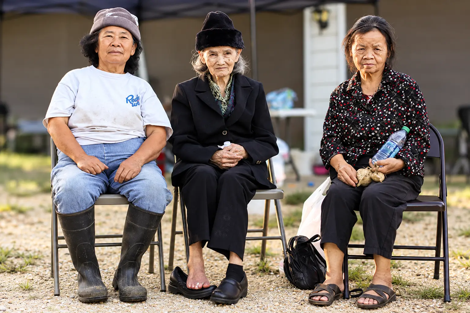 Three elderly Hmong women whose stories form part of GHAC history